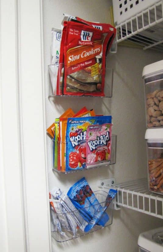 pantry organization idea for small items and food packets. -- Easy DIY small kitchen organization ideas and storage tips for your cabinets, your countertops, under your sink and in your pantry! I'll bet you could go to the dollar store or dollar tree and do these projects for cheap. These hacks are great for apartments! Listotic.com  