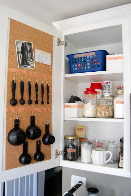 Cork board inside of kitchen cabinets to pin recipes and notes. -- Easy DIY small kitchen organization ideas and storage tips for your cabinets, your countertops, under your sink and in your pantry! I'll bet you could go to the dollar store or dollar tree and do these projects for cheap. These hacks are great for apartments! Listotic.com  