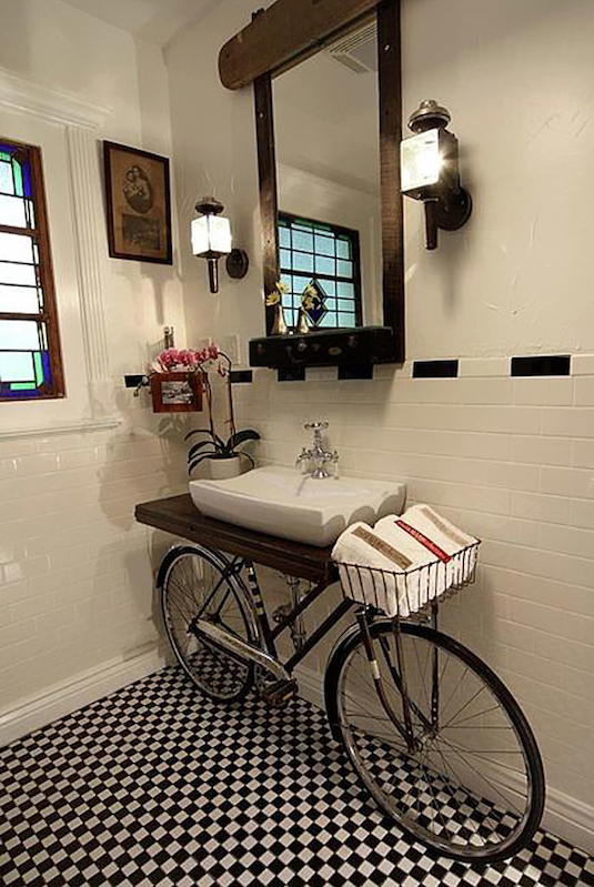 Bicycle Sink -- Easy DIY furniture makeovers and ideas! A lot of repurposed thrift store projects and chalk paint ideas so that you can do it for cheap. Before and after photos of dressers, tables, shelves, tv stands and more! For bedrooms and living rooms. Listotic.com