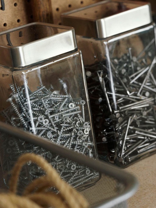 Repurpose kitchen containers in the garage for screws, nails and bolts. Everything from shelves to tools! Men AND women will love these tricks. Listotic.com