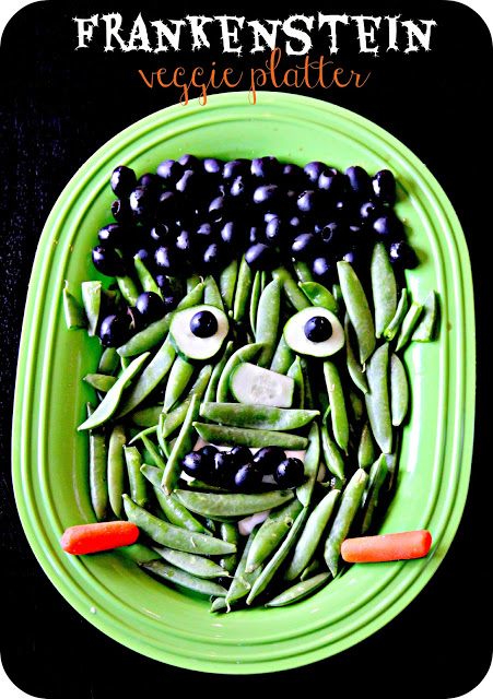 Frankenstein veggie platter healthy Halloween snacks for a crowd.