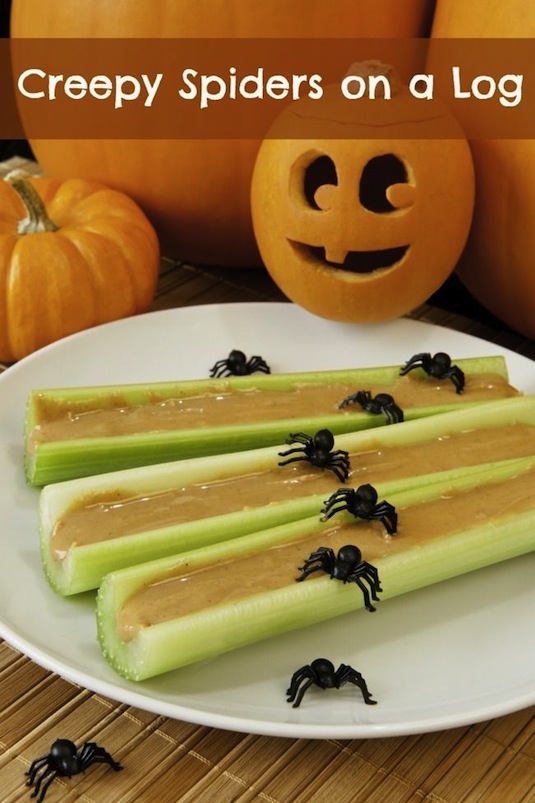 Healthy Halloween snacks with celery and peanut butter.
