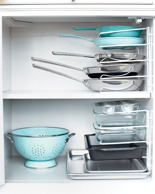 50 Genius Storage Ideas ~ Turn a bakeware rack sideways and use it to store pans and baking dishes!