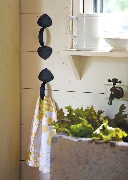 50 Genius Storage Ideas ~ Use door handles instead of towel hooks for your hand towels!