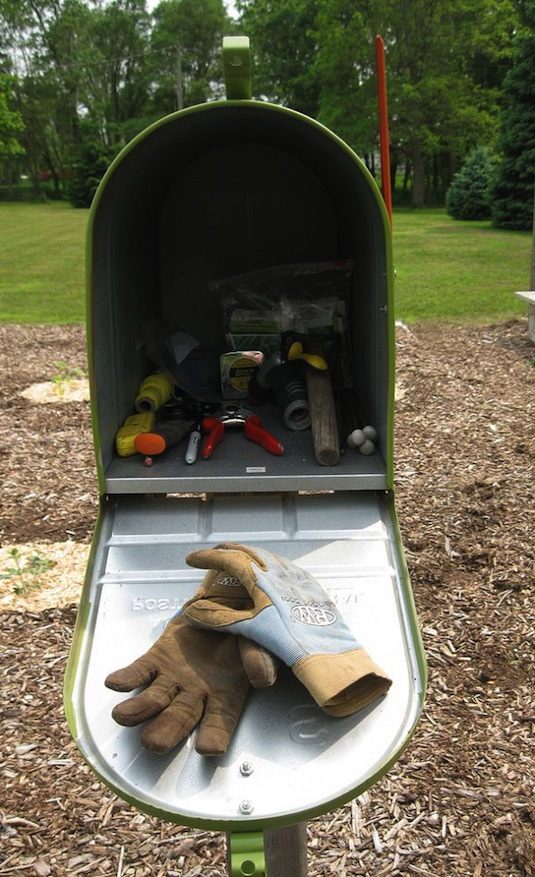 50 Genius Storage Ideas ~ Keep your small garden tools and gloves handy in a charming mailbox!