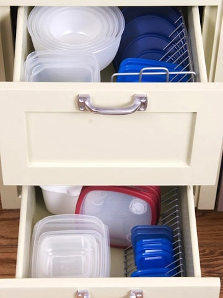 50 Genius Storage Ideas ~ Use a CD rack to store tupperware lids!