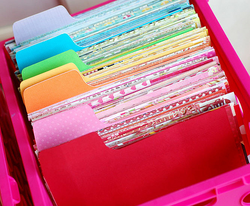 50 Genius Storage Ideas ~ File your scrapbook and craft paper! Easier to find when you need it.