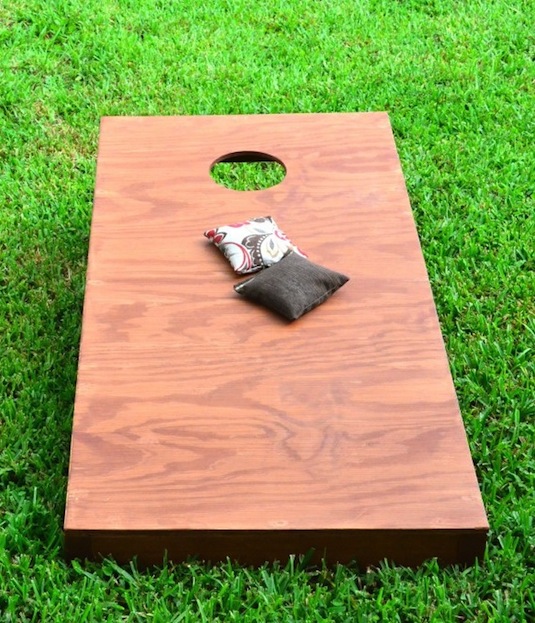 32 Of The Best DIY Backyard Games You Will Ever Play -- Make your own corn hole board.