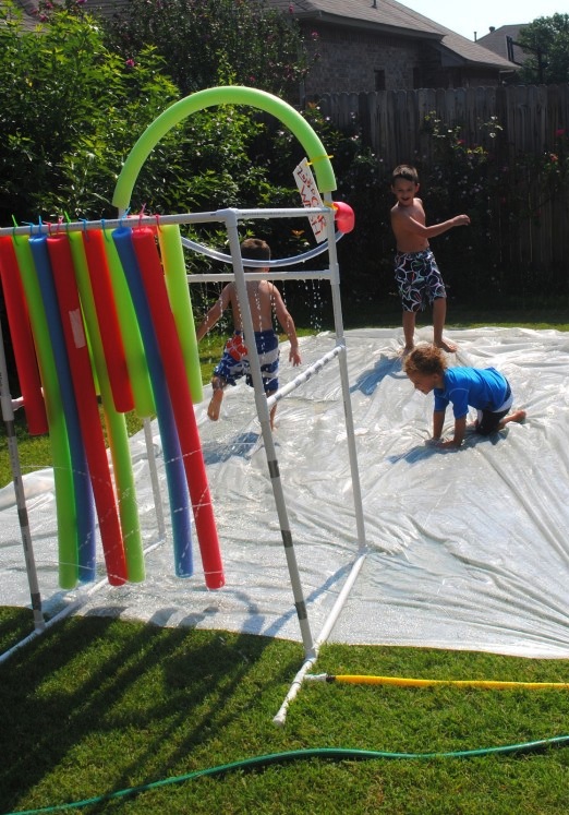 32 Of The Best DIY Backyard Games You Will Ever Play -- Make an outdoor play area with plastic sheeting, PVC pipe, and pool noodles!