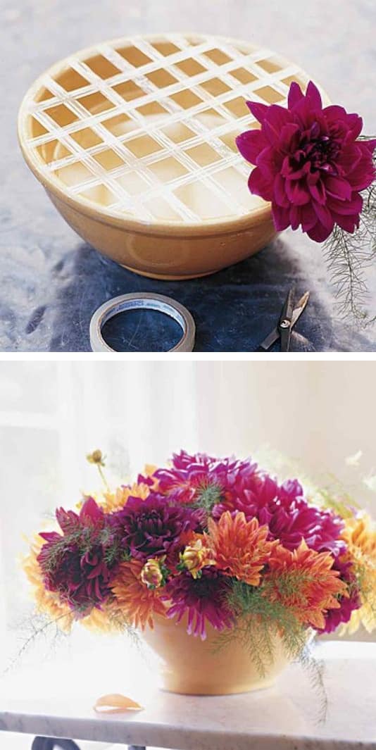 #1. Use a grid of tape to keep your flowers in place. -- 13 Clever Flower Arrangement Tips & Tricks