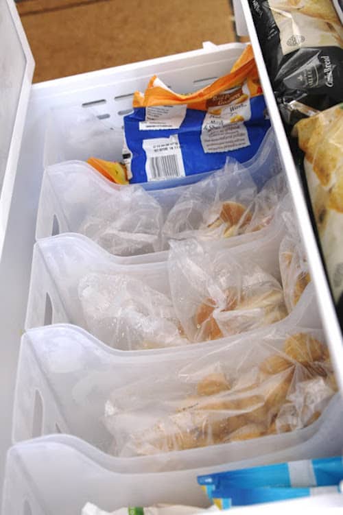 #8. Organize large freezer drawers with plastic bins... keeps everything from getting burried! | 11 Brilliant Fridge and Freezer Organization Ideas -- Use these refrigerator tips and tricks to keep your fridge organized and clean! A few of these DIY hacks will also free up space and save you a few bucks on wasted or spoiled food (a few dollar store ideas here). | Listotic