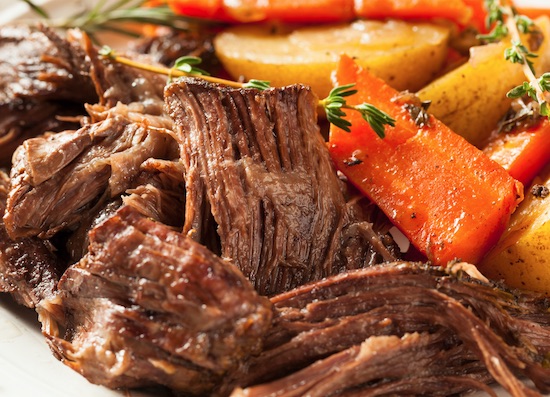 tender pot roast made in the crock pot with potatoes and carrots