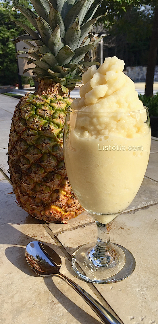 A 2 Ingredient, healthy pineapple soft serve like treat! This healthy snack recipe is similar to a smoothie but thicker and creamier. The perfect guilt-free, dairy-free dessert! | Listotic.com