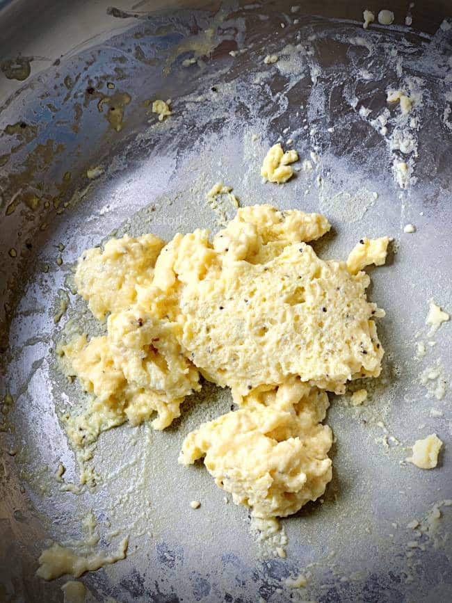 Scrambled eggs in a skillet completed.
