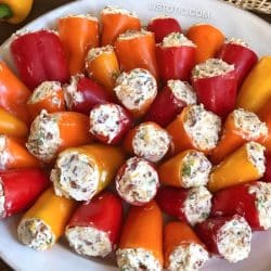 Cream Cheese filled jalepeno peppers (Party Poppers) on a plate.