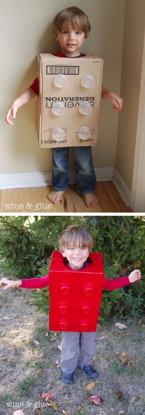 Boy in a box with applesauce cups attached and spray painted to look like a lego block Halloween costume.