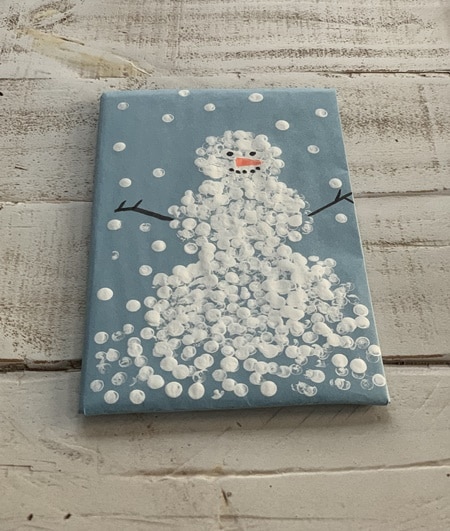 Painted snowman wrapping paper.