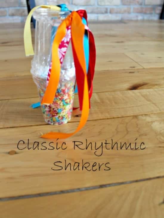  Repurpose your clear plastic cups to make an easy rhythmic sprinkle shaker with colorful ribbon.