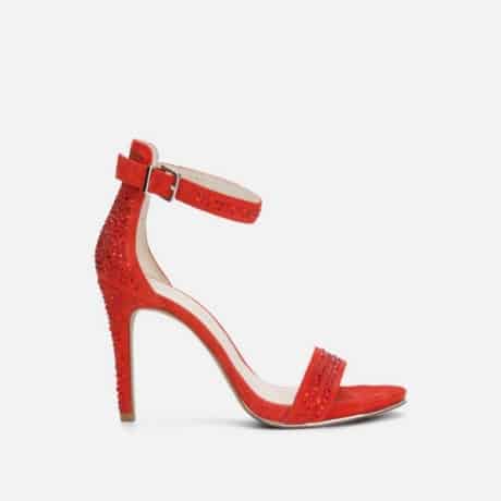 Beautiful red high heels to wear for a wedding or night on the town. Glamorous women’s red shoe. 