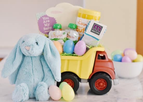 Alternative Easter Basket Dump Truck filled with Easter treats and a Jelly cat stuffed bunny.