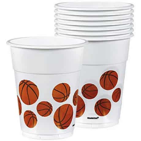 Stack of white plastic cups with printed basketball images for a March Madness Tournament basketball themed party.