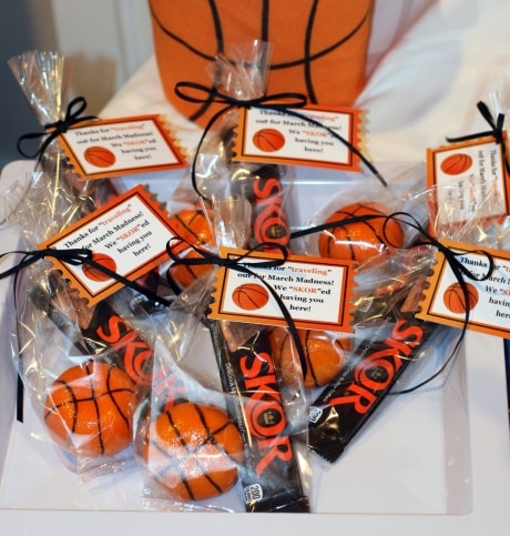 March Madness party favors with Skor candy bars for guests at party dessert tables.