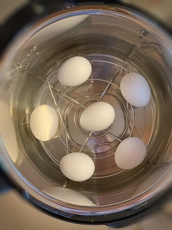 Hard boiled eggs for easy peeling from the Instant Pot recipe.