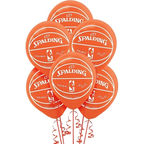 Grouping of 6 orange party city balloons with imprint of the Spalding college basketball logo to be displayed at a March madness party.