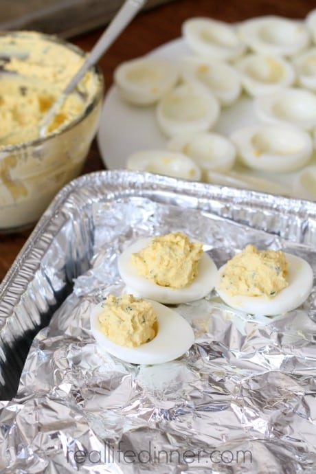 aluminum file and recycled egg cartons to make a diy deviled egg carrier for parties