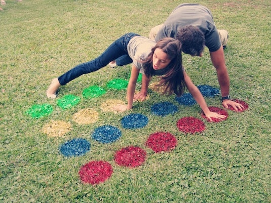 Backyard games including twister - painted circles of red, blue, yellow and green.