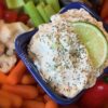Lime Cucumber Dill Veggie Dip displayed with fresh veggies.