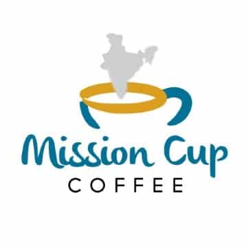 Mission Cup Coffee logo - a cup of coffee with the steam making an image that looks like the country of India. Offering cold brew coffee.