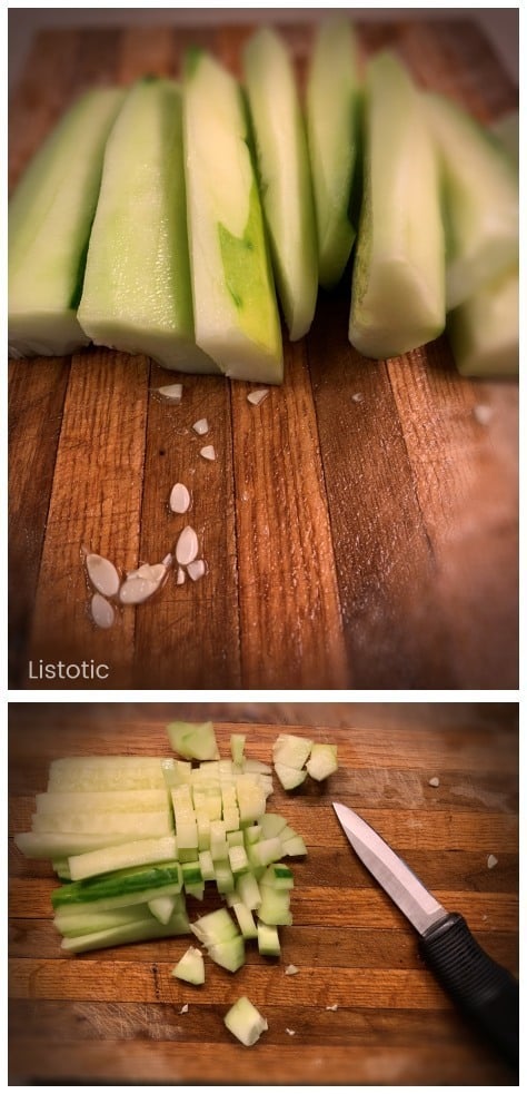 Cutting board and knife with diced chopped deseeded fresh garden cucumbers.