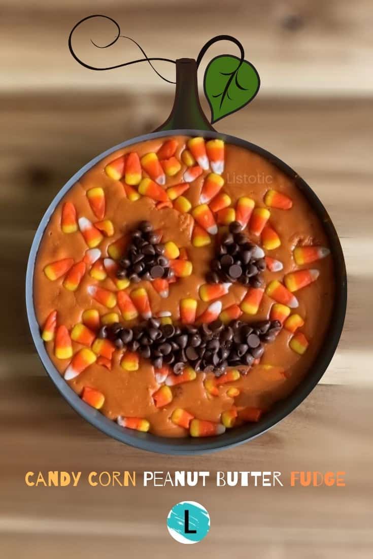 Pan of candy corn Butterfinger fudge sitting on a Halloween Party table 