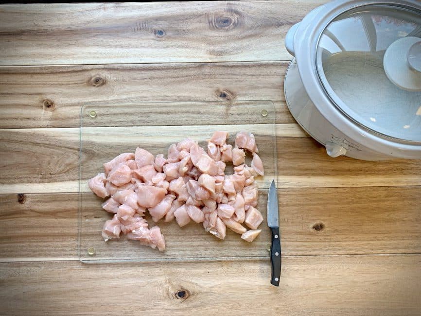 Bite sized pieces of chicken cut up for recipe.