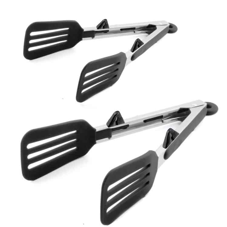 Black thick spatula kitchen tongs that lift heavy foods.