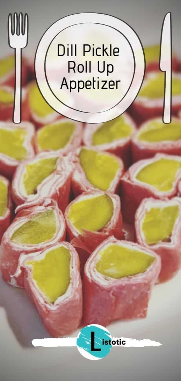 rolled up dill pickles appetizer with cream cheese and beef lunchen meat on a white plate
