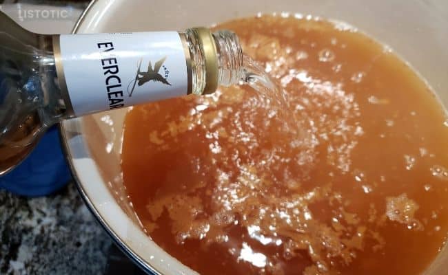 Adding Everclear to Apple Pie Moonshine recipe.