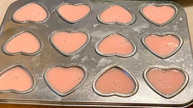 Strawberry Milk poured inside heart shaped molds