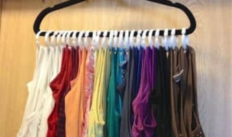 tank tops on a hanger using shower curtain hooks