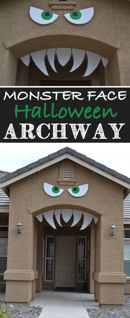 Homemade Halloween Decorations monster face in the archway of a home. Using the fornt door to make a house look like it is a creepy monster with sharp teeth and mean eyes
