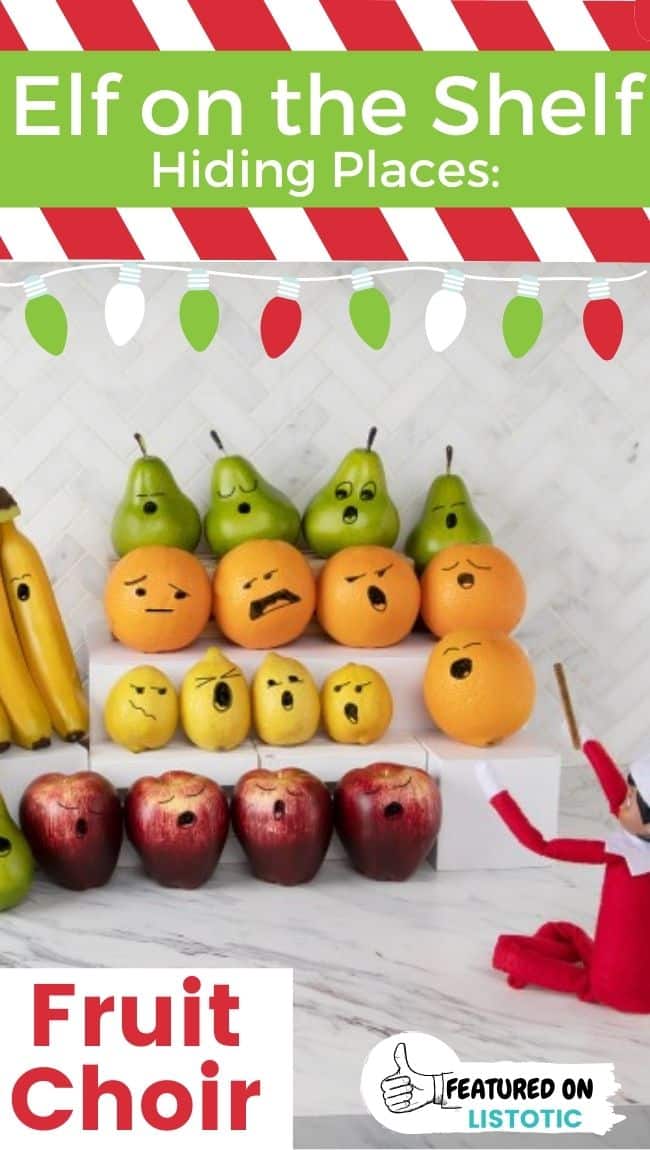 Elf on the Shelf doll conducting a fruit choir.