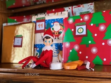 elf on the shelf ready for a Christmas book countdown activity