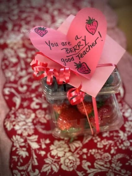 containers of berries with a valentine for teacher attached with ribbon