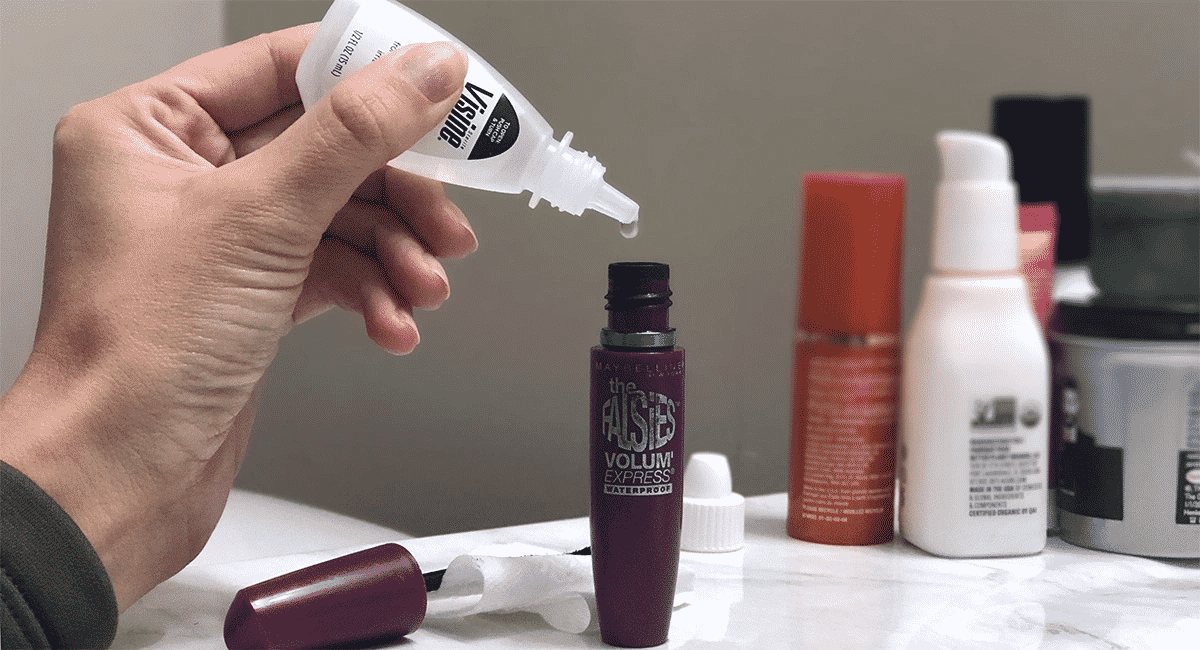 adding drops to bottle