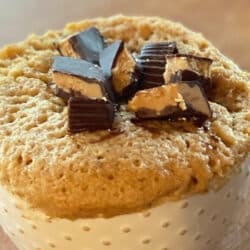 Peanut butter mug cake with peanut butter cup topping.