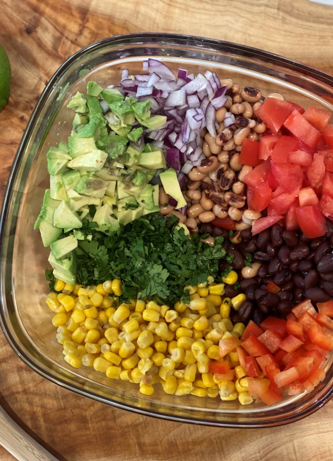 separated ingredients for cowboy caviar dip side dish 