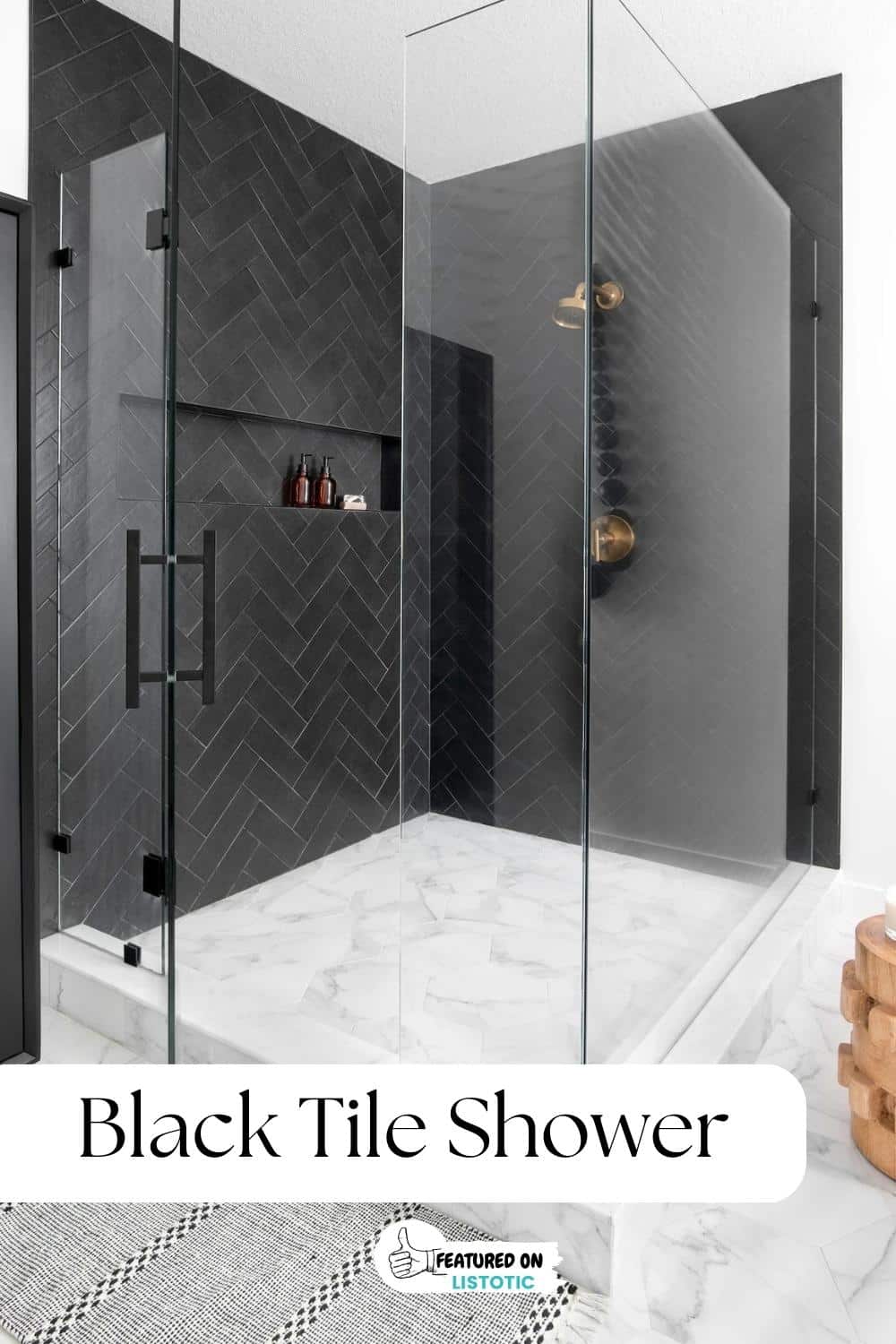 black herringbone tile shower with white shower floor tile