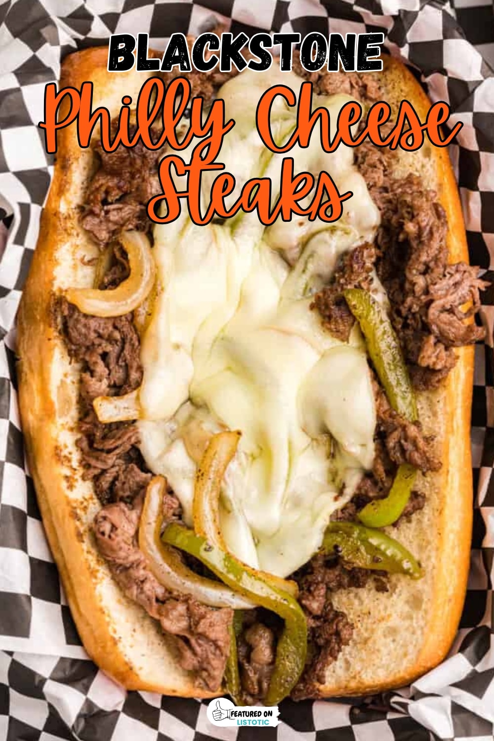 Philly Cheesesteaks Cooking on a Blackstone Griddle with Peppers and Onions