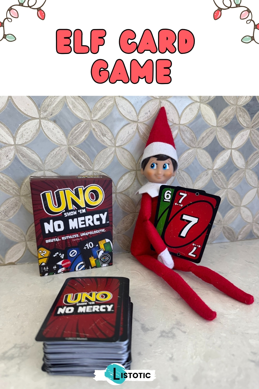 Elf on the Shelf playing a card fame holding the cards six and seven.